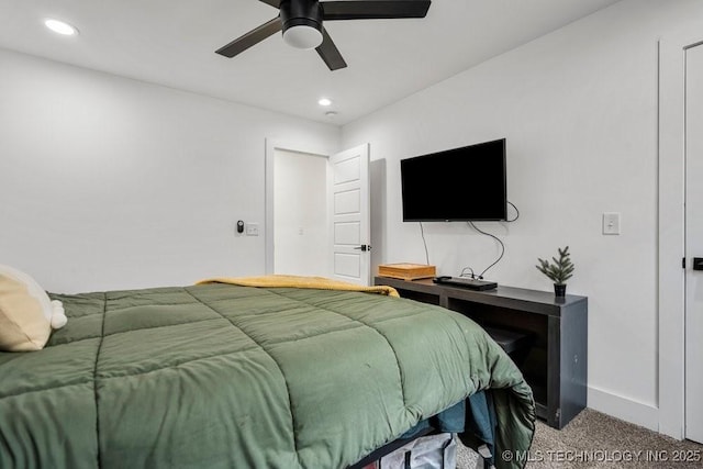 bedroom featuring recessed lighting, carpet flooring, baseboards, and a ceiling fan