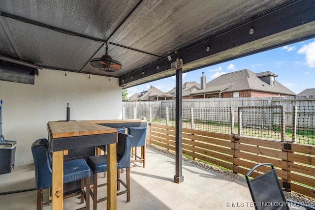 view of patio / terrace with ceiling fan and a fenced backyard