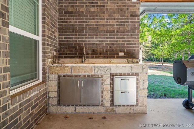 view of entry to storm shelter
