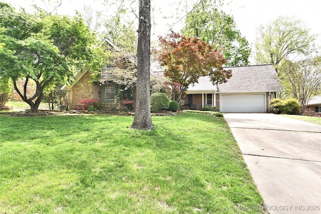 3638 E 69th Pl, Tulsa, OK 74136 - view of front of house featuring a front lawn, driveway, roof with shingles, and a garage