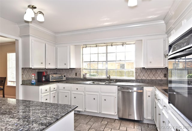 3638 E 69th Pl, Tulsa, OK 74136 - kitchen featuring stainless steel dishwasher, white cabinetry, and a sink