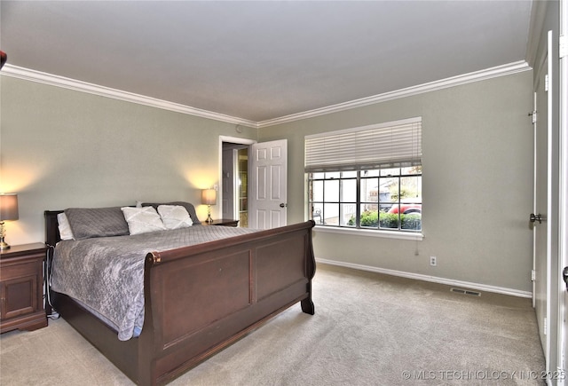 3638 E 69th Pl, Tulsa, OK 74136 - carpeted bedroom featuring baseboards, visible vents, and ornamental molding