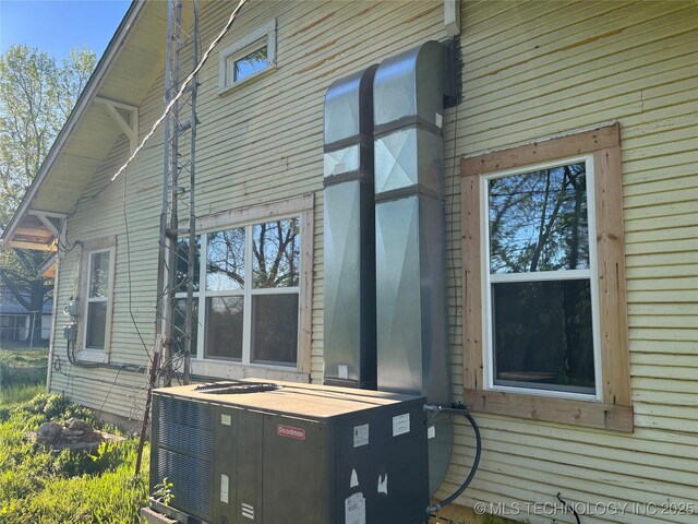 view of home's exterior featuring central air condition unit