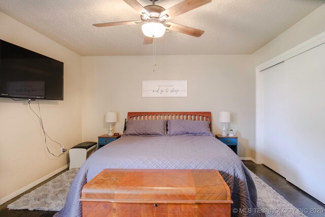 3745 E 420th Rd, Adair, OK 74330 - carpeted bedroom with baseboards, a ceiling fan, and a textured ceiling