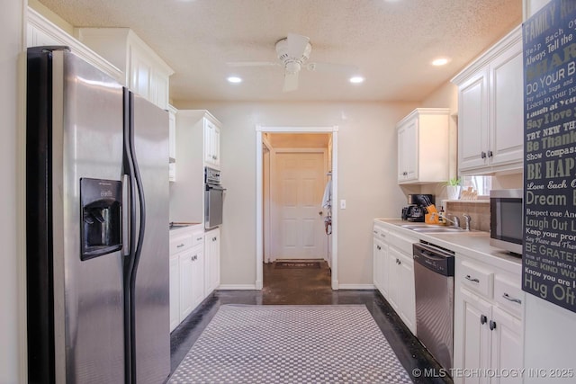 3745 E 420th Rd, Adair, OK 74330 - kitchen featuring baseboards, white cabinetry, stainless steel appliances, and recessed lighting