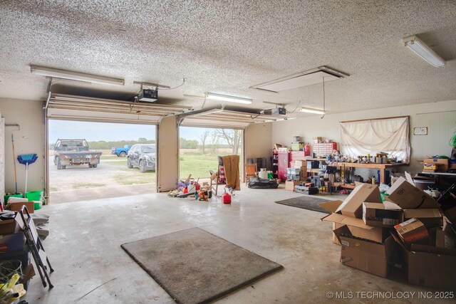3745 E 420th Rd, Adair, OK 74330 - garage featuring a garage door opener