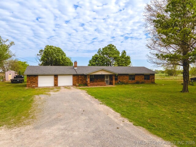 3745 E 420th Rd, Adair, OK 74330 - ranch-style house with an attached garage, dirt driveway, a chimney, and a front yard