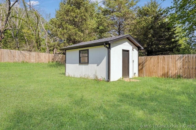 view of shed featuring a fenced backyard