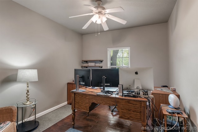 home office with baseboards, wood finished floors, and a ceiling fan