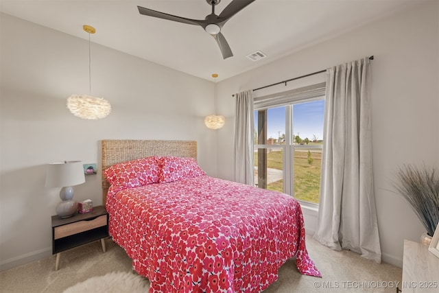 18576 N Jamestown Ave, Skiatook, OK 74070 - carpeted bedroom with baseboards, visible vents, and a ceiling fan