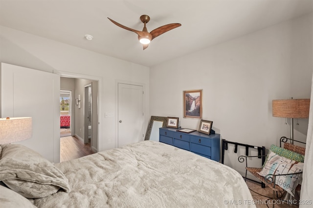 18576 N Jamestown Ave, Skiatook, OK 74070 - bedroom with a ceiling fan and wood finished floors