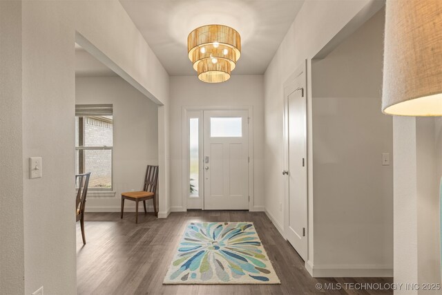 18576 N Jamestown Ave, Skiatook, OK 74070 - foyer with wood finished floors, baseboards, and a notable chandelier