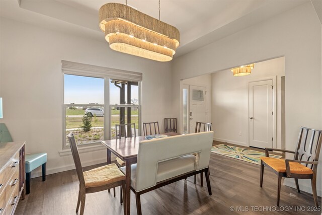 18576 N Jamestown Ave, Skiatook, OK 74070 - dining room featuring baseboards and dark wood finished floors