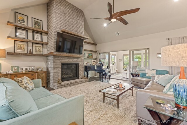 18576 N Jamestown Ave, Skiatook, OK 74070 - living room with ceiling fan, a brick fireplace, high vaulted ceiling, and visible vents
