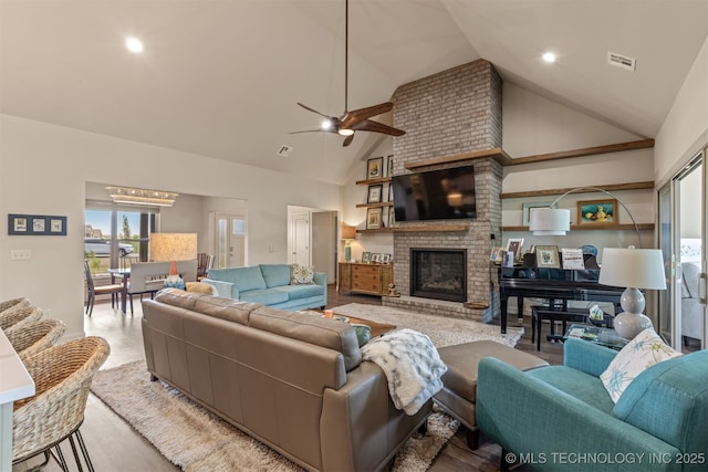 18576 N Jamestown Ave, Skiatook, OK 74070 - living area featuring high vaulted ceiling, visible vents, recessed lighting, ceiling fan, and a brick fireplace