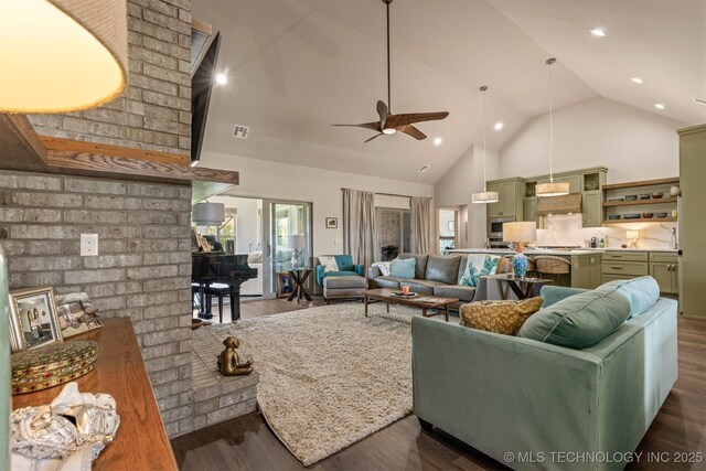 18576 N Jamestown Ave, Skiatook, OK 74070 - living room featuring ceiling fan, recessed lighting, high vaulted ceiling, and dark wood-style flooring