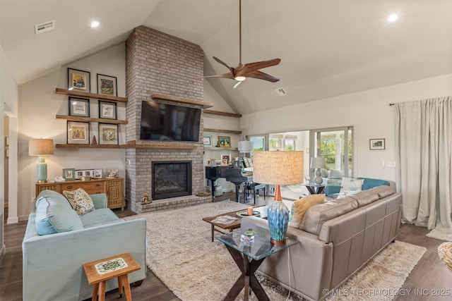 18576 N Jamestown Ave, Skiatook, OK 74070 - living room featuring a ceiling fan, wood finished floors, visible vents, and high vaulted ceiling