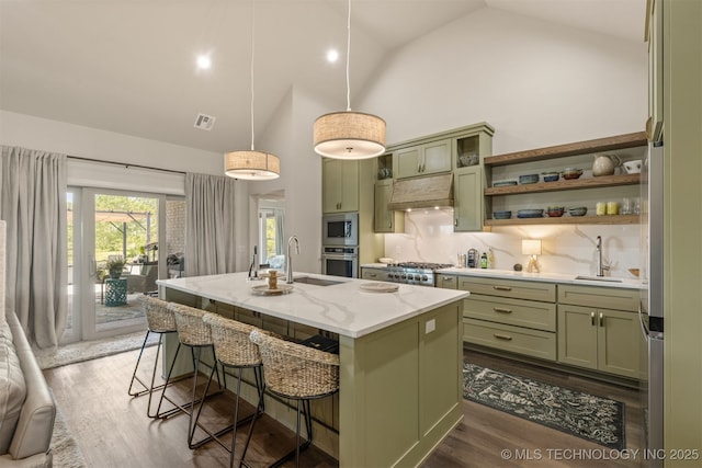 18576 N Jamestown Ave, Skiatook, OK 74070 - kitchen with green cabinetry, appliances with stainless steel finishes, a sink, and extractor fan