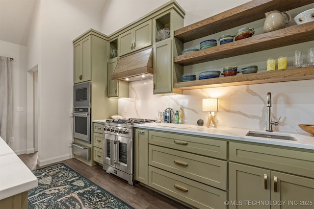 18576 N Jamestown Ave, Skiatook, OK 74070 - kitchen with stainless steel appliances, green cabinets, a sink, and a warming drawer