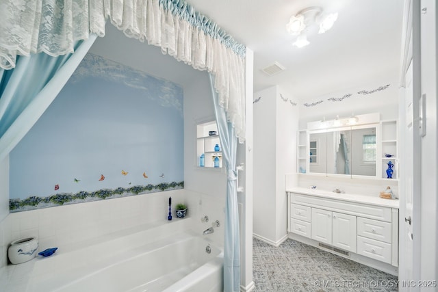 857 Bayshore Dr, Sand Springs, OK 74063 - bathroom with a garden tub, vanity, and baseboards
