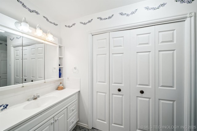 857 Bayshore Dr, Sand Springs, OK 74063 - bathroom featuring a closet and vanity