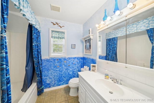 857 Bayshore Dr, Sand Springs, OK 74063 - bathroom featuring vanity, toilet, and shower / tub combo with curtain