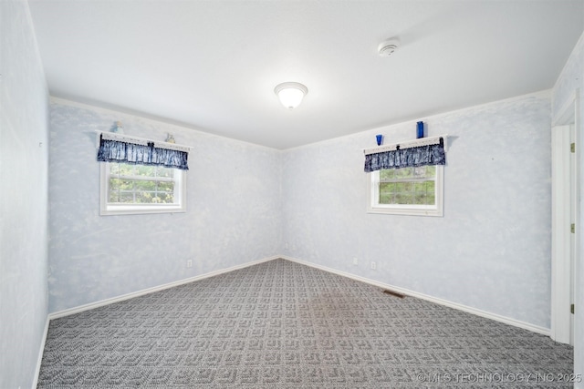 857 Bayshore Dr, Sand Springs, OK 74063 - empty room featuring a smoke detector, carpet, and baseboards