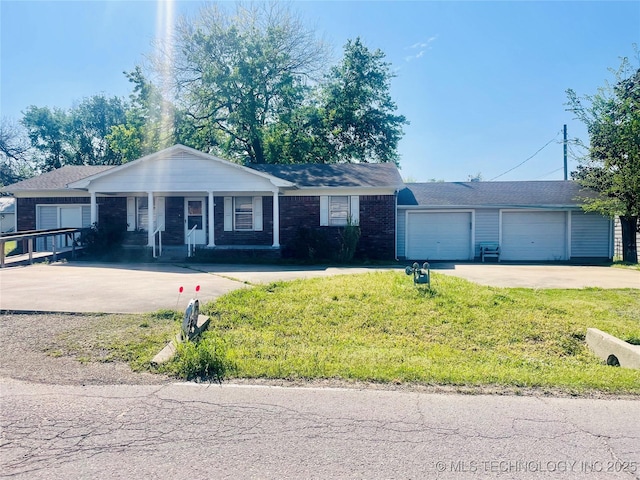 109 Ash Ave, Fort Gibson, OK 74434 - single story home with an attached garage, driveway, a porch, and a front lawn
