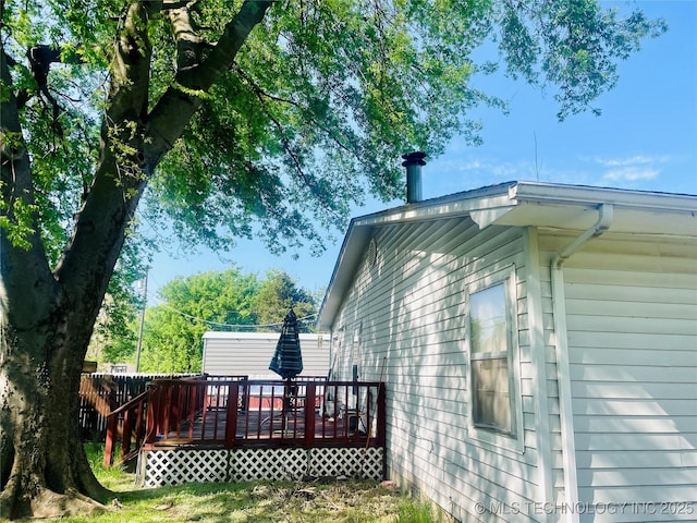 109 Ash Ave, Fort Gibson, OK 74434 - view of property exterior featuring a wooden deck