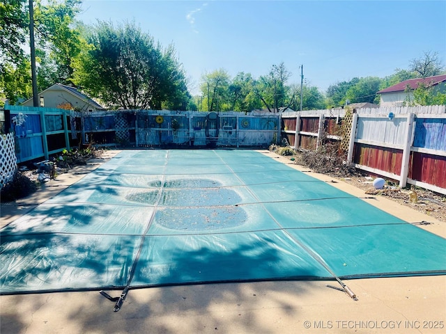 109 Ash Ave, Fort Gibson, OK 74434 - view of sport court with a fenced backyard