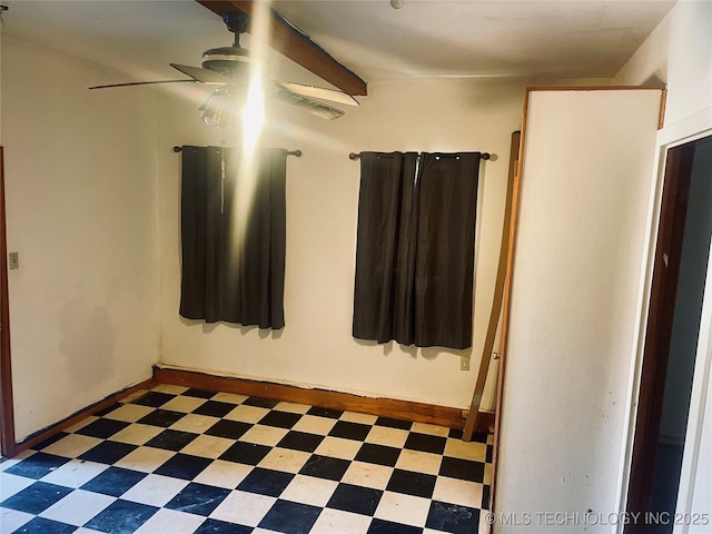 109 Ash Ave, Fort Gibson, OK 74434 - unfurnished room featuring baseboards, a ceiling fan, and tile patterned floors