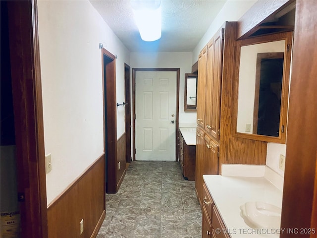109 Ash Ave, Fort Gibson, OK 74434 - hall featuring a textured ceiling