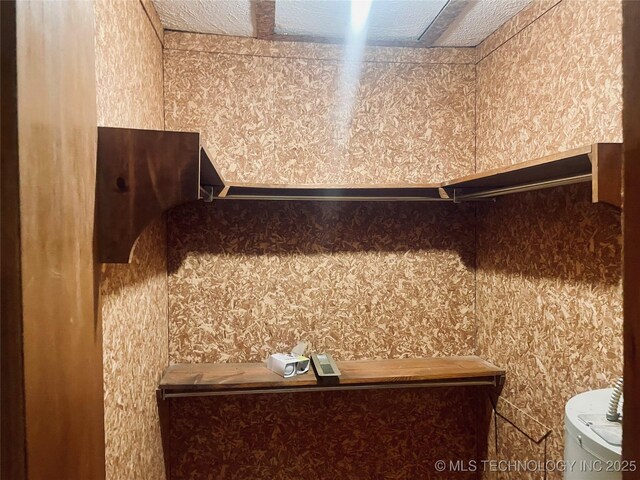 109 Ash Ave, Fort Gibson, OK 74434 - bathroom featuring wallpapered walls and toilet