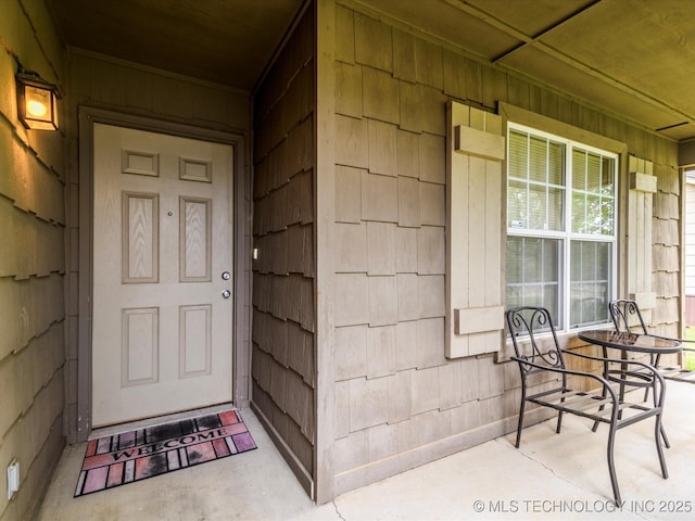 property entrance with a porch