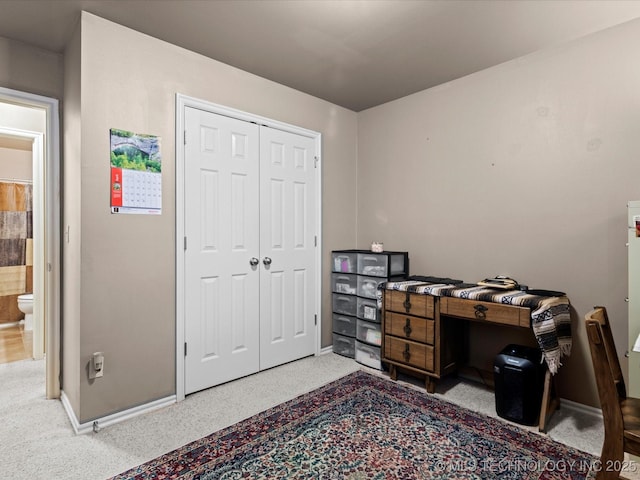 office area featuring baseboards