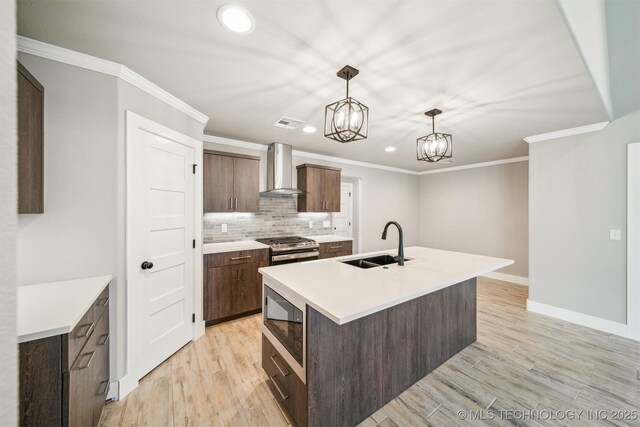 919 E 11th St, Claremore, OK 74017 - kitchen featuring wall chimney range hood, built in microwave, a sink, recessed lighting, and light countertops