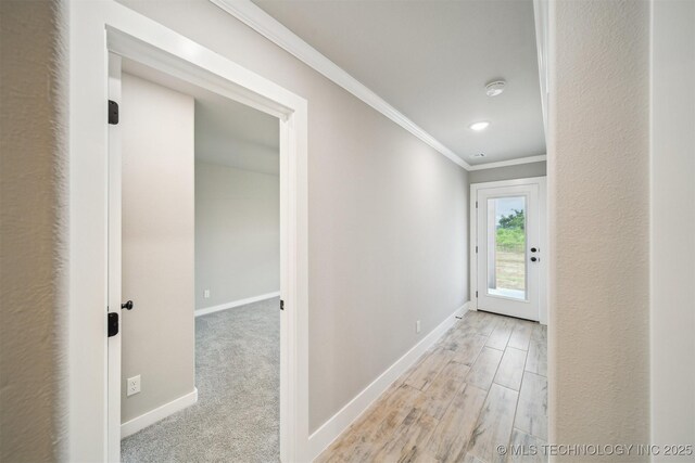 919 E 11th St, Claremore, OK 74017 - corridor with crown molding, baseboards, light wood-style flooring, and recessed lighting