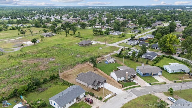 919 E 11th St, Claremore, OK 74017 - aerial view of property's location with nearby suburban area