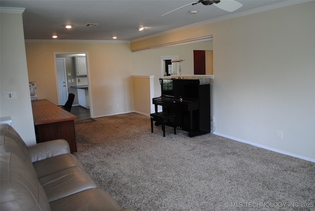 carpeted living area featuring crown molding, ceiling fan, baseboards, visible vents, and recessed lighting