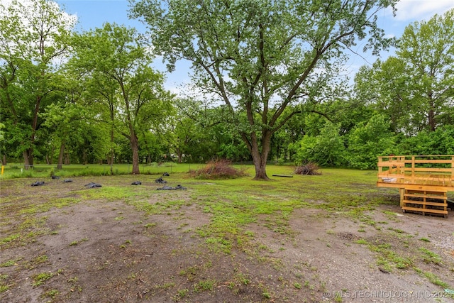 view of yard with a deck