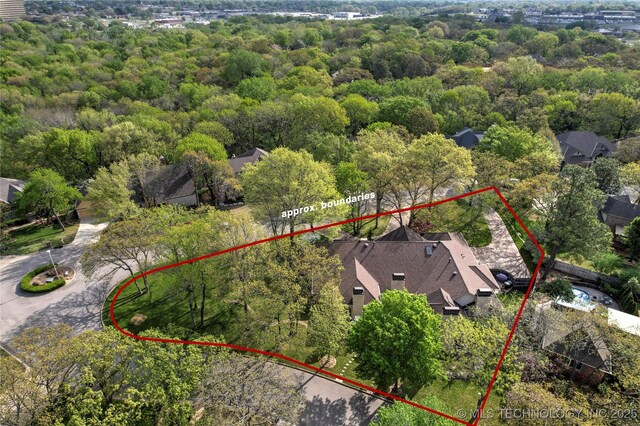 749 Brookhollow Ln, Bartlesville, OK 74006 - aerial view with a forest view