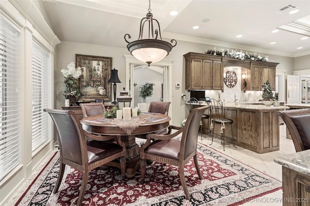 749 Brookhollow Ln, Bartlesville, OK 74006 - dining space with visible vents, recessed lighting, and crown molding