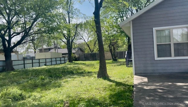 view of yard with fence