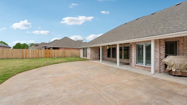 view of patio featuring a fenced backyard and area for grilling