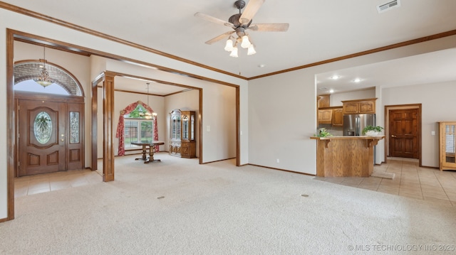 interior space featuring visible vents, crown molding, baseboards, and light carpet