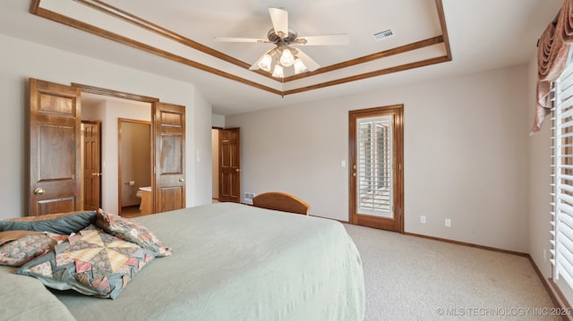 bedroom featuring a ceiling fan, a raised ceiling, light colored carpet, access to exterior, and visible vents