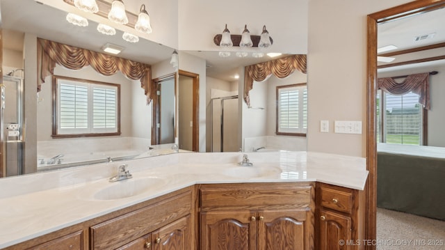 full bath featuring a bath, visible vents, and a sink