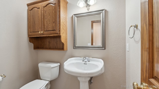 half bathroom with toilet