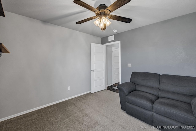 carpeted living room with visible vents, baseboards, and ceiling fan