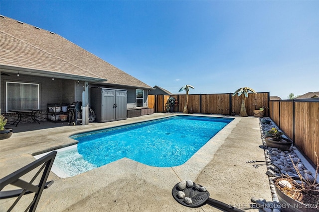 view of pool featuring a fenced backyard, a fenced in pool, and a patio